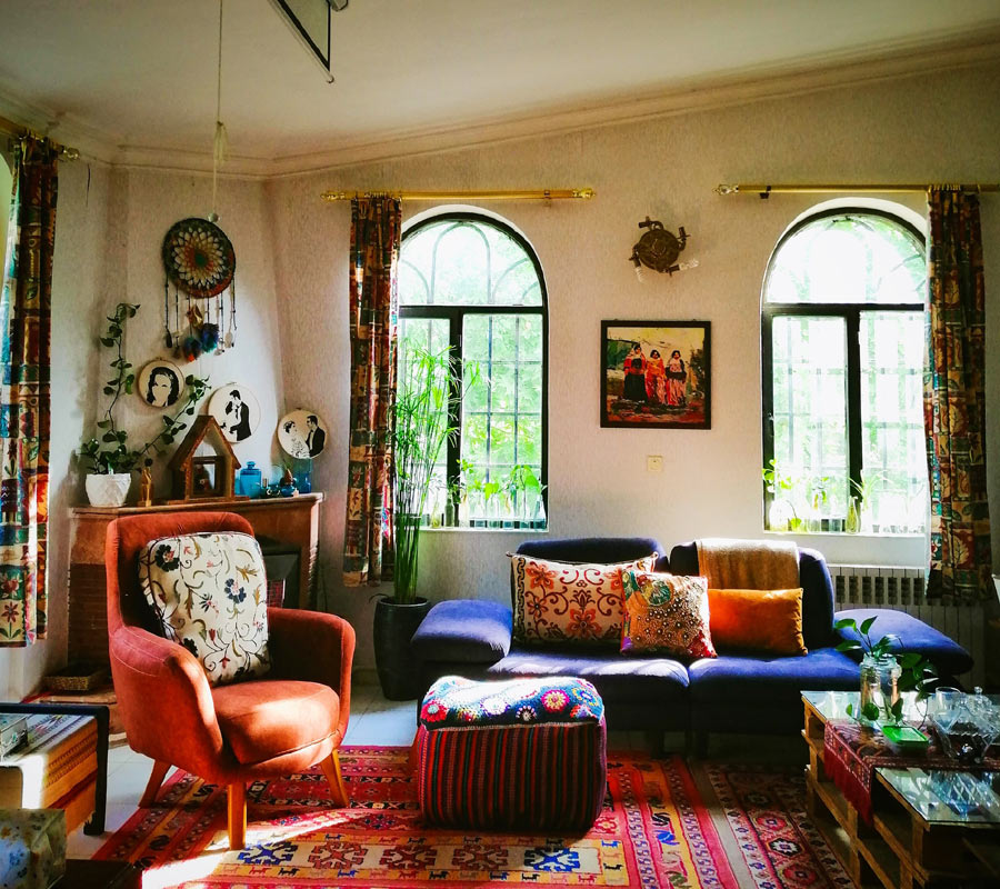 Room with scatter cushions and poufs