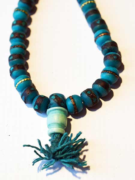 Turquoise inlaid bone mala