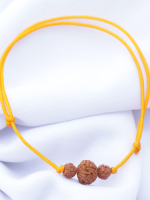 Handcrafted Rudraksha seed bracelet and necklace set with 8mm and 6mm beads on an adjustable black cord, displayed on a fabric background.