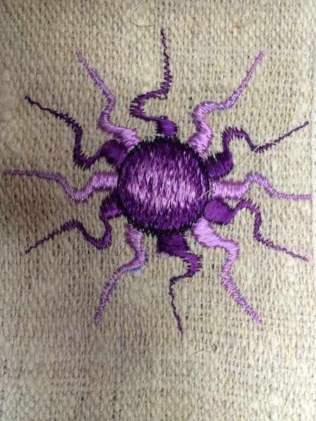Sun embroidered hemp wallet