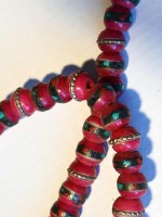 Tibetan red inlay bone mala with 108 prayer beads.